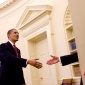 handshake_Obama_shaking_hands_with_a_guest