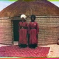 1905_1915_Sergei_Mikhailovich_Prokudin-Gorskii_Two_men_standing_on_a_rug_in_front_of_yurt_1905_1915