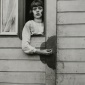 1926_August_Sander_Mädchen_im_Zirkuswagen._Köln_from_Menschen_des_20er_Jahrhunderts_Young_Girl_in_Circus_Wagon__from_The_People_of_the_Twentieth_Century_1926