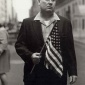 1971_Diane_Arbus_Veteran_with_a flag_NYC_1971